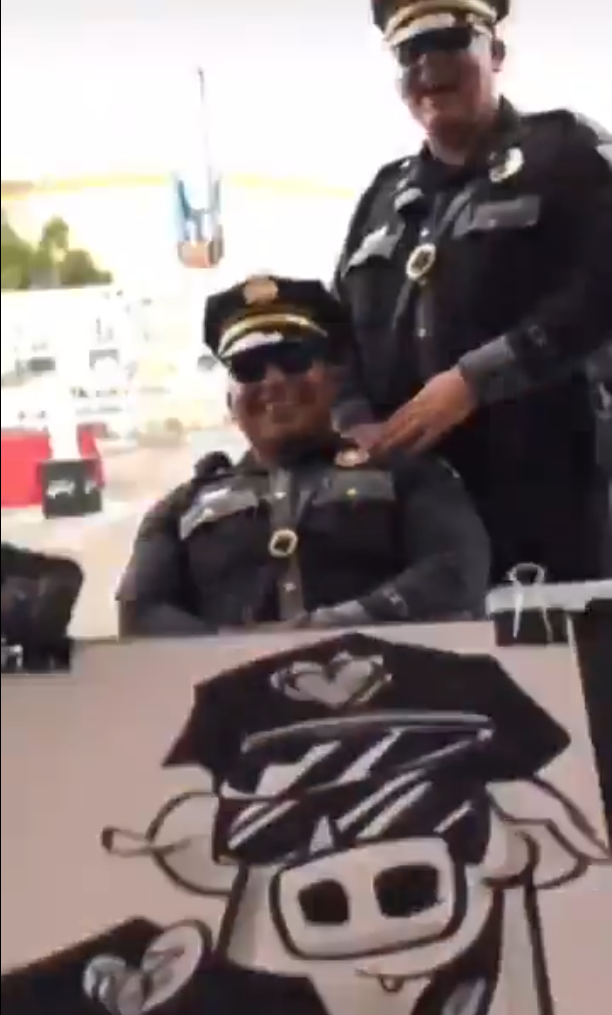 Officers Embrace “Pig” Nickname with Humor at Community Event